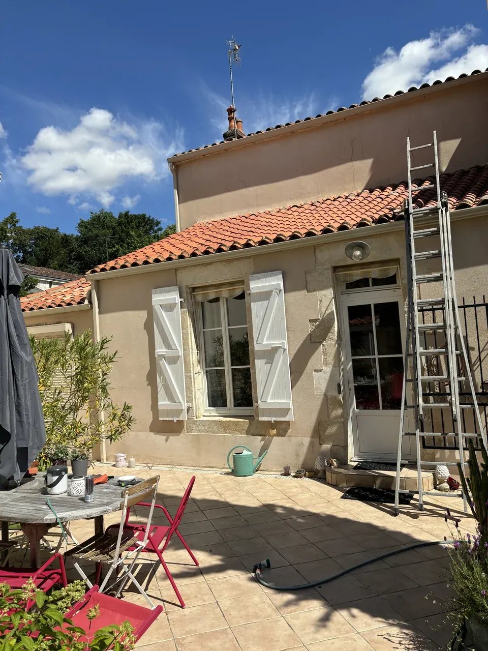 Maison après les travaux de réparation de toiture